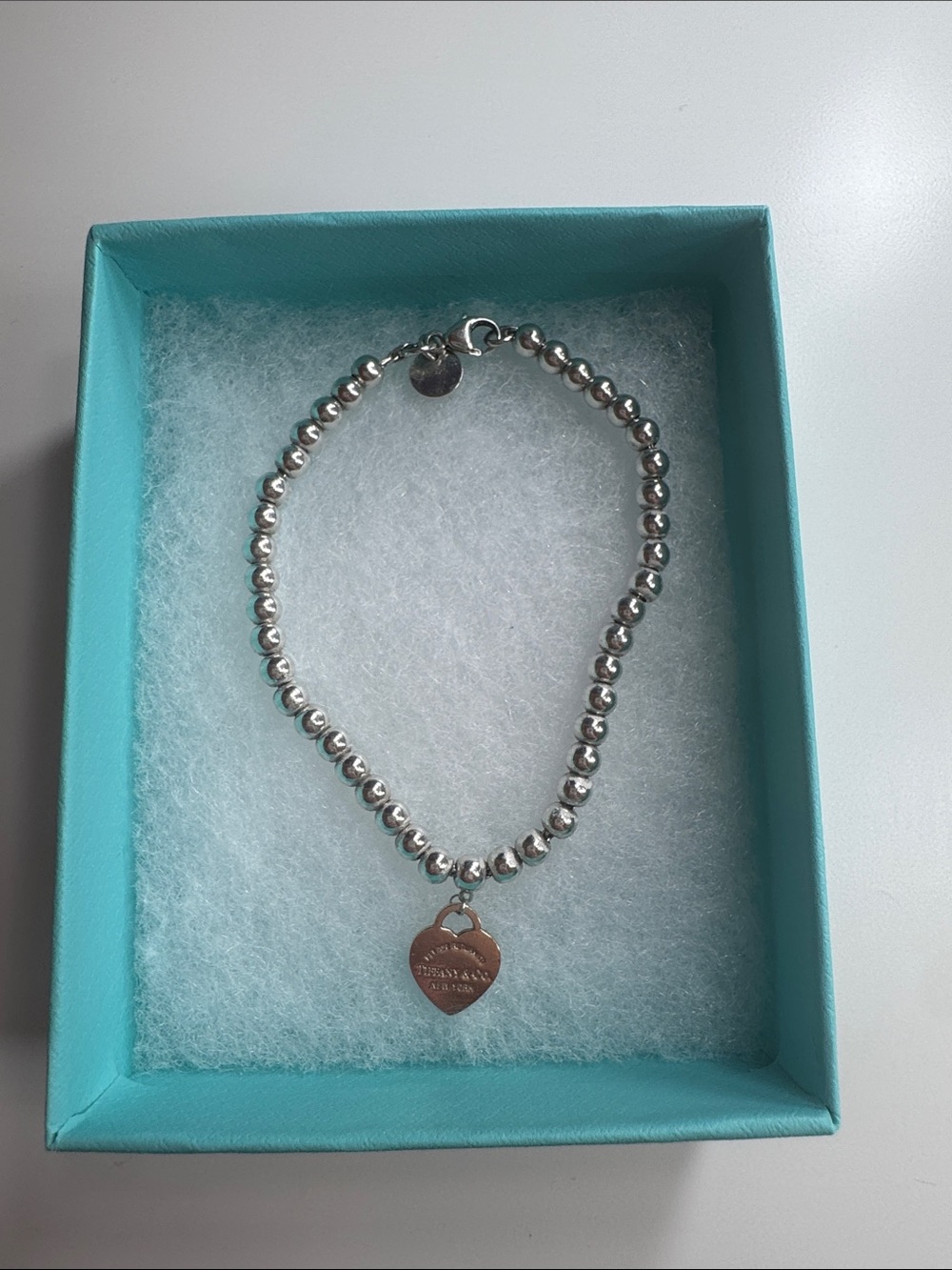 Tiffany & Co. Silver Bead Bracelet with Rose Gold Heart Tag
